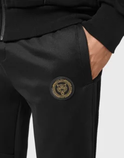 Tracksuit: Zip-up Jacket + jogging pants Statement